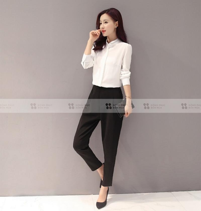 Áo sơ mi trắng với quần và giày cao gót đen là outfit kinh điển của dân văn phòng