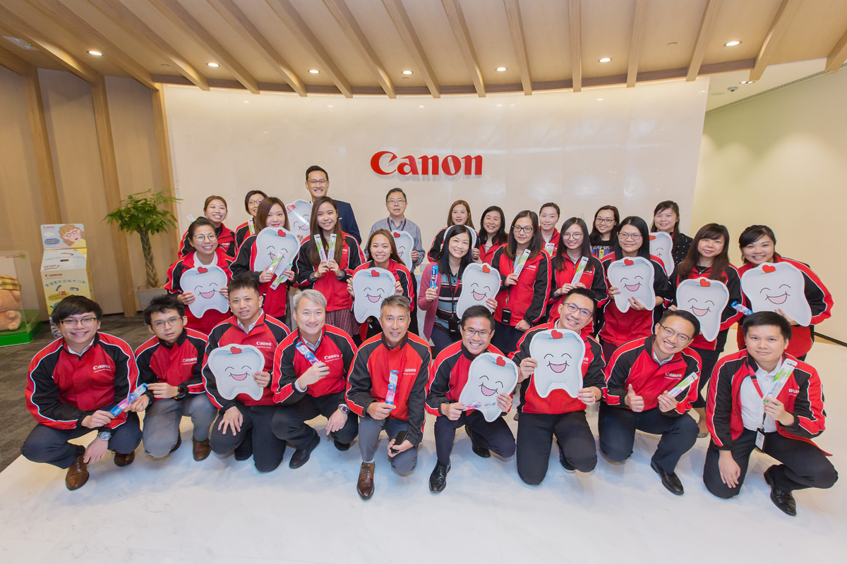 Đồng phục công ty Canon: Chuyên nghiệp trong từng chiếc áo 1 Đồng phục công ty Canon - nét đẹp trong văn hóa doanh nghiệp
