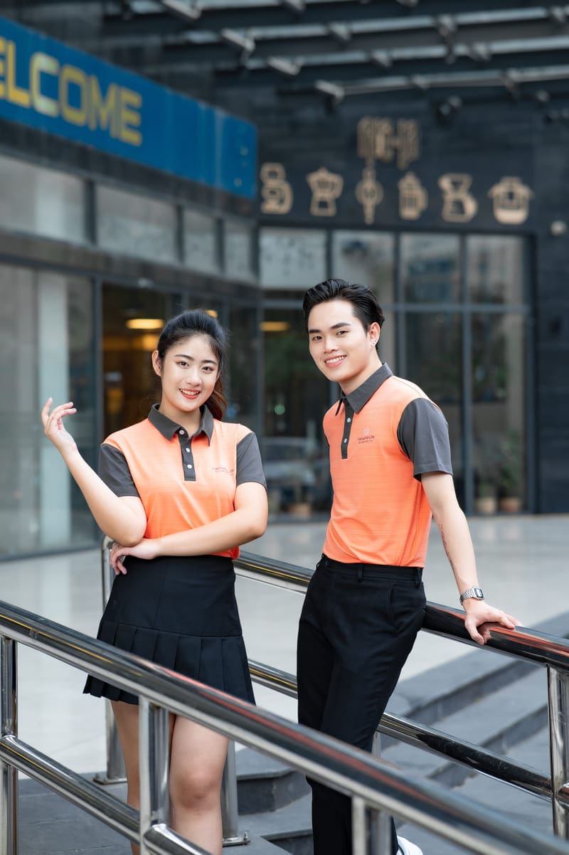 Áo đồng phục doanh nghiệp màu cam phối xám 3 Áo đồng phục doanh nghiệp màu cam phối xám - Ảnh 3