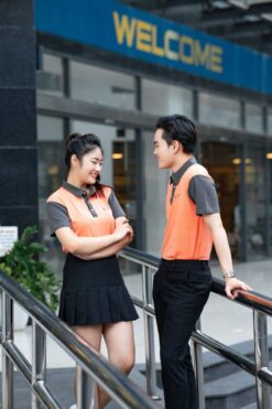 Áo đồng phục doanh nghiệp màu cam phối xám 17 dong phuc cong so 7