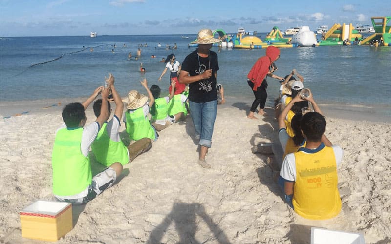 Top 7+ Trò Chơi Team Building Trên Biển Thú Vị Nhất 2025 8 Trò chơi team building ngoài biển đồng lòng tát biển đông